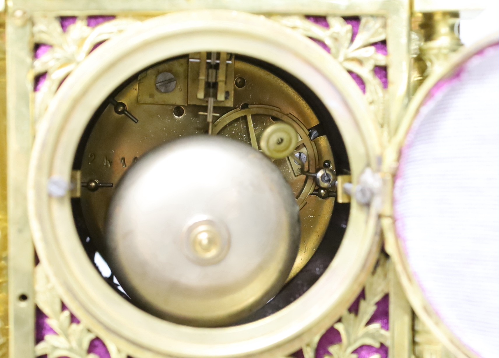 A French cast brass mantel clock in period style, 42cms high